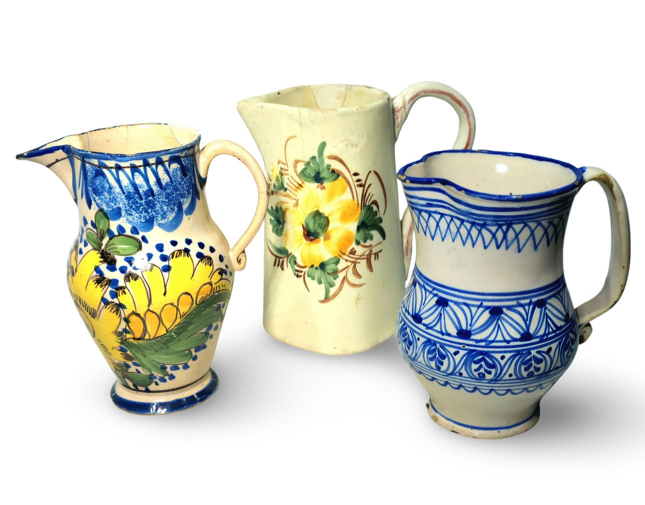 Three 18th century glazed ceramic jugs.