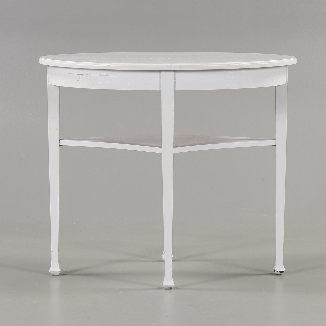 A table with shelf, early 20th century.