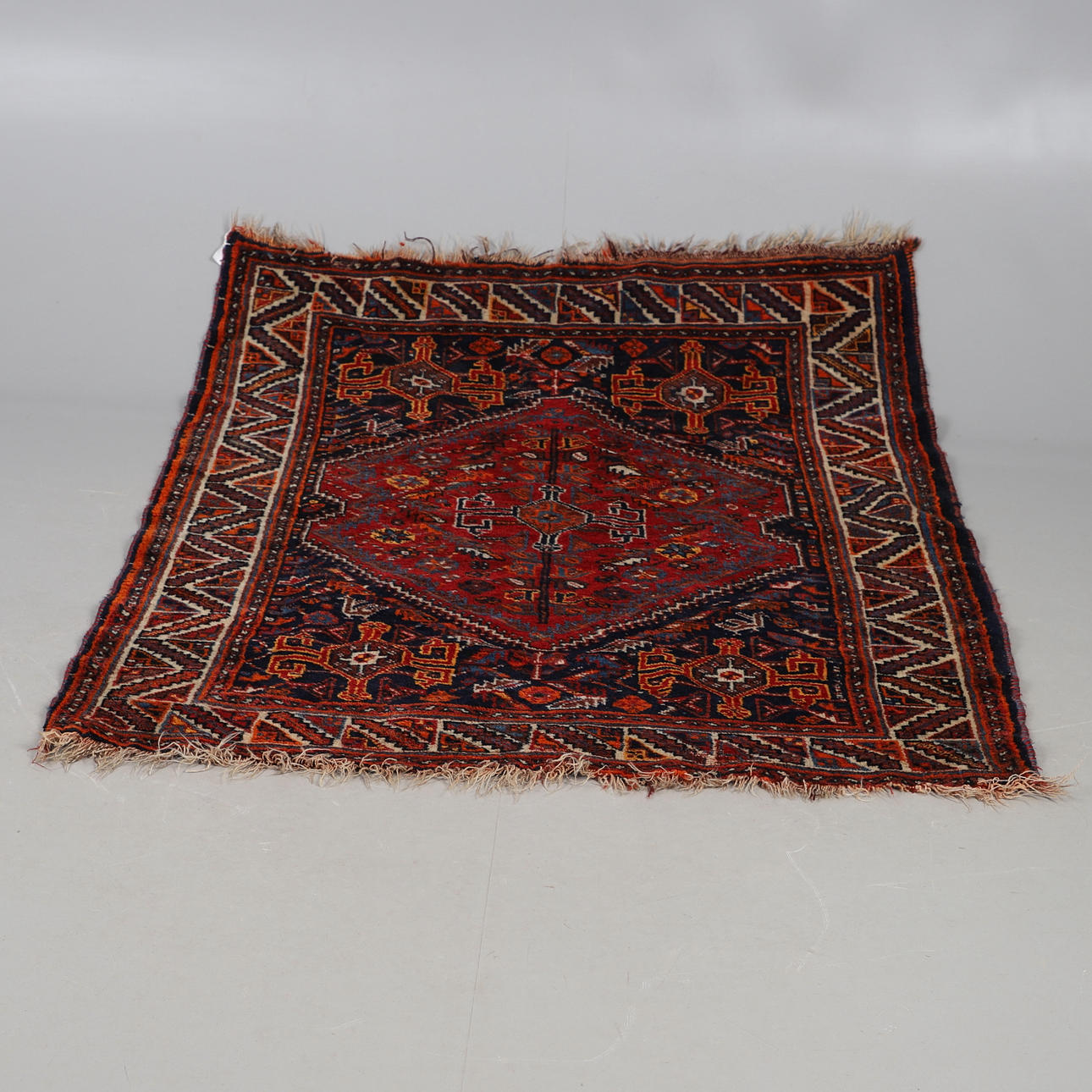 A HAMADAN RUG.