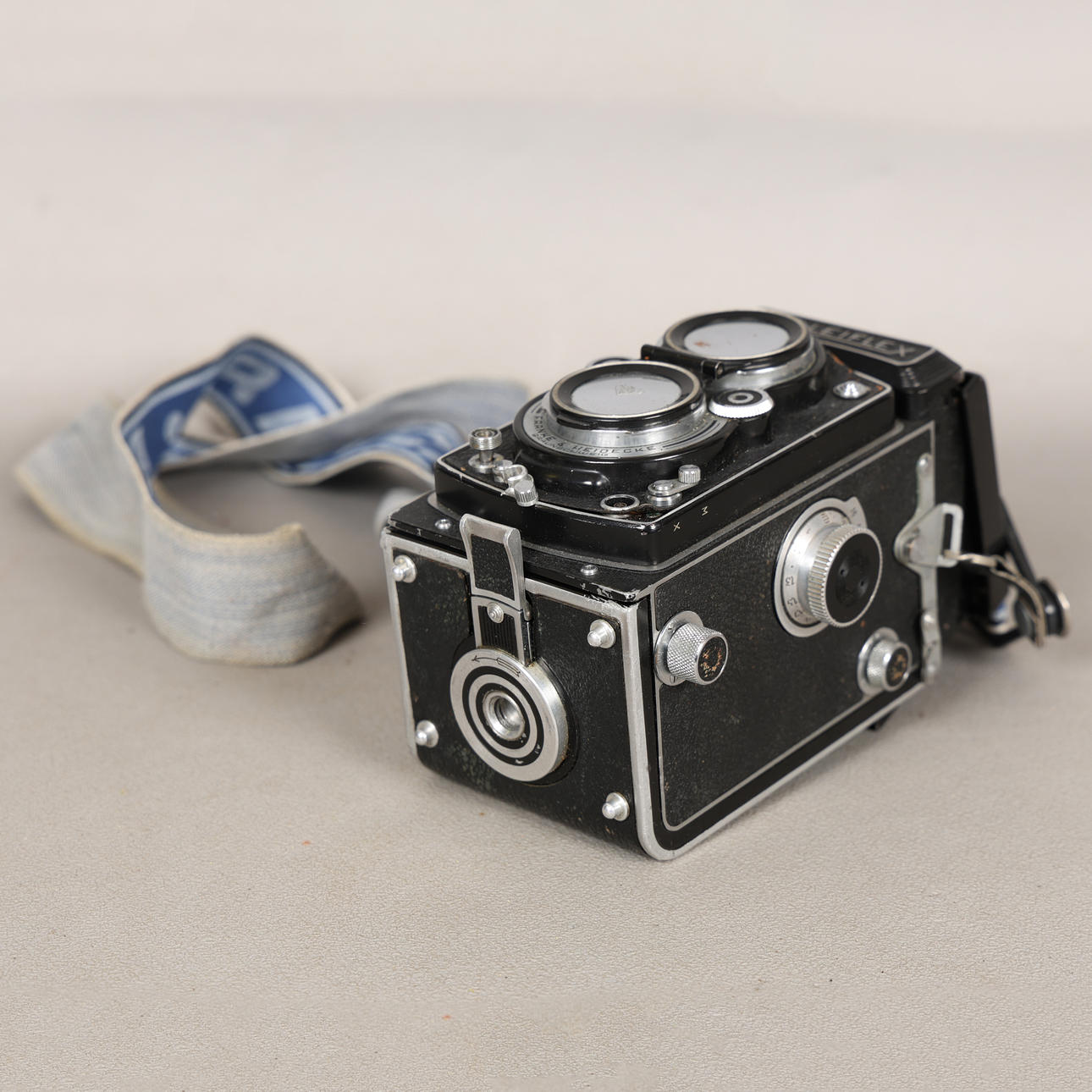A ROLLEIFLEX CAMERA.