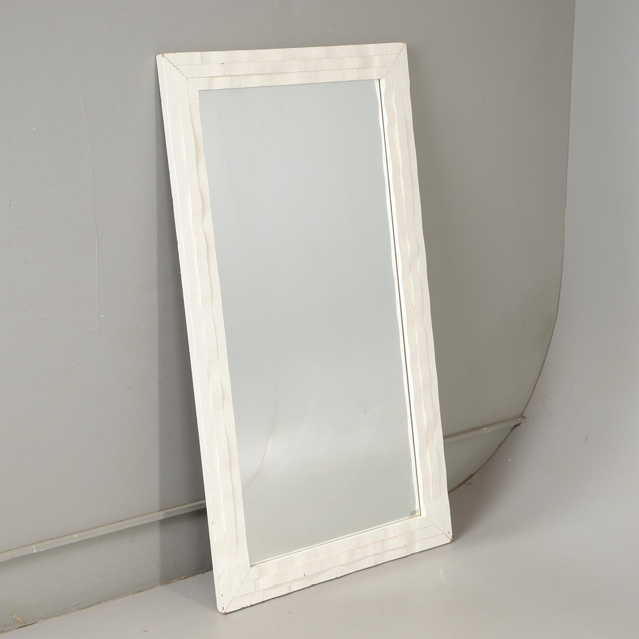 A mirror, painted, Eriksmålaglas, mid 20th century.