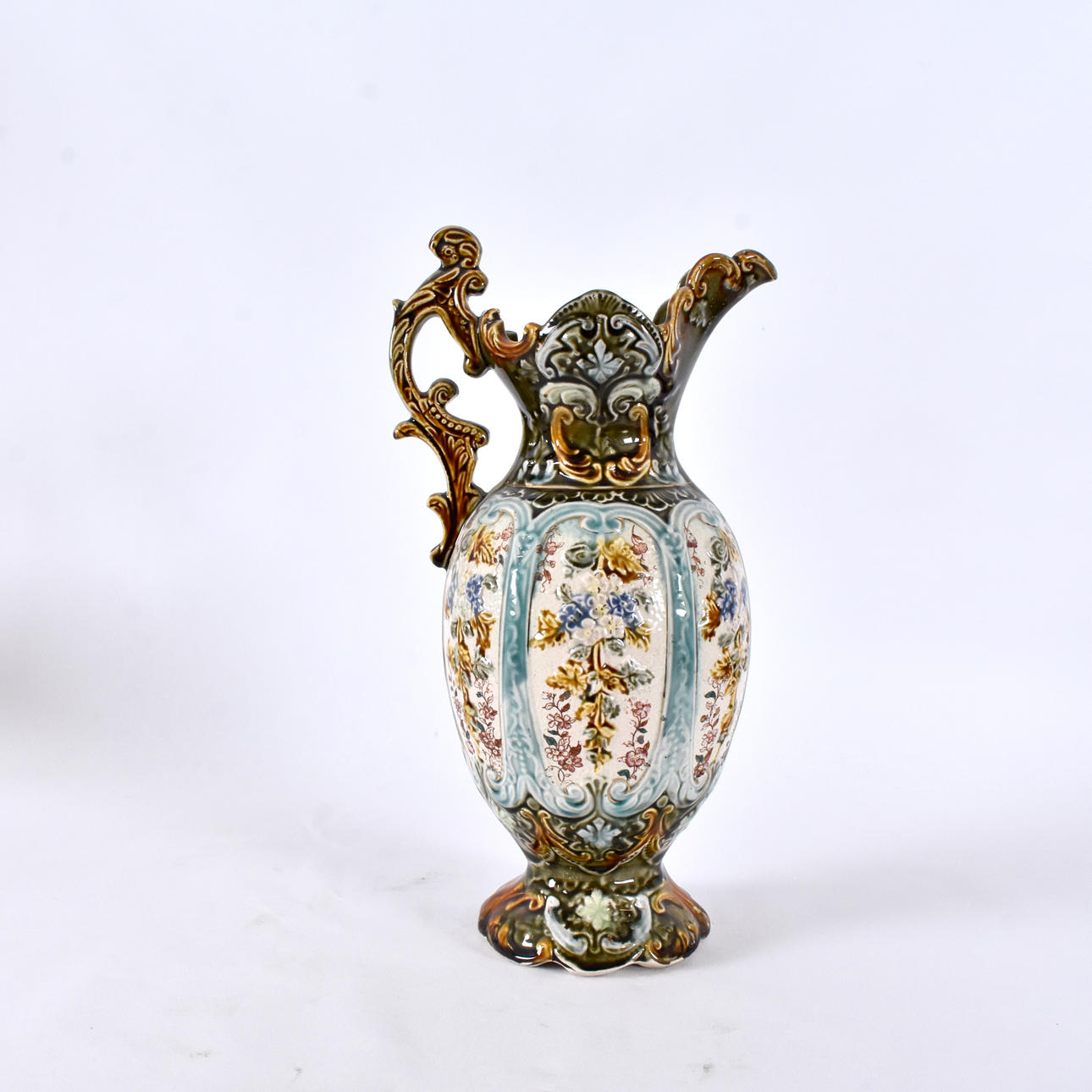 A 20th-century majolica jug.