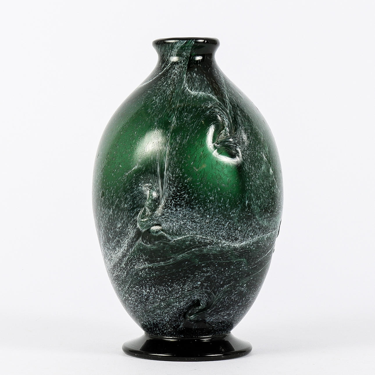Vase green glass blacksmith overhang.