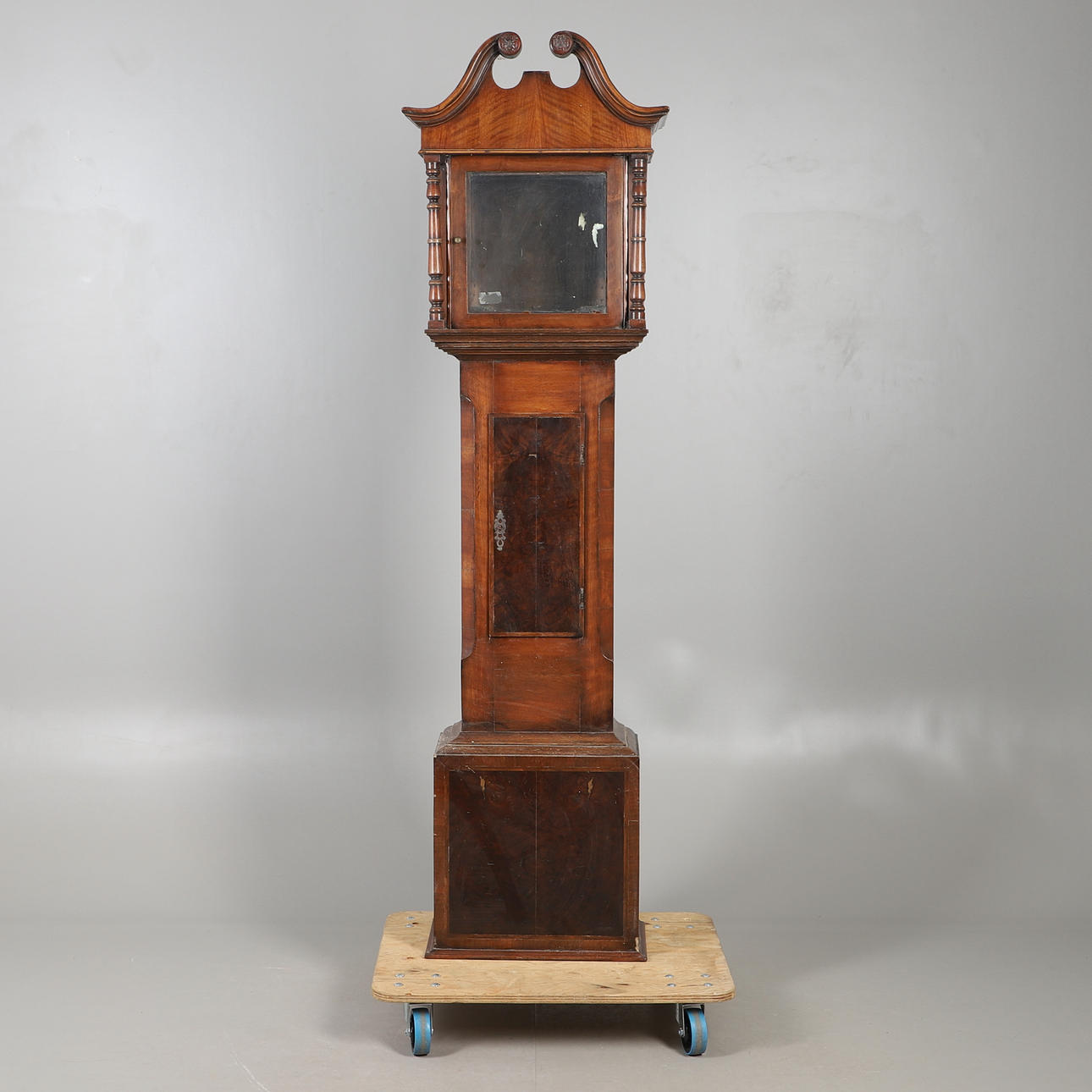 A MAHOGANY LONGCASE CLOCK CASE.