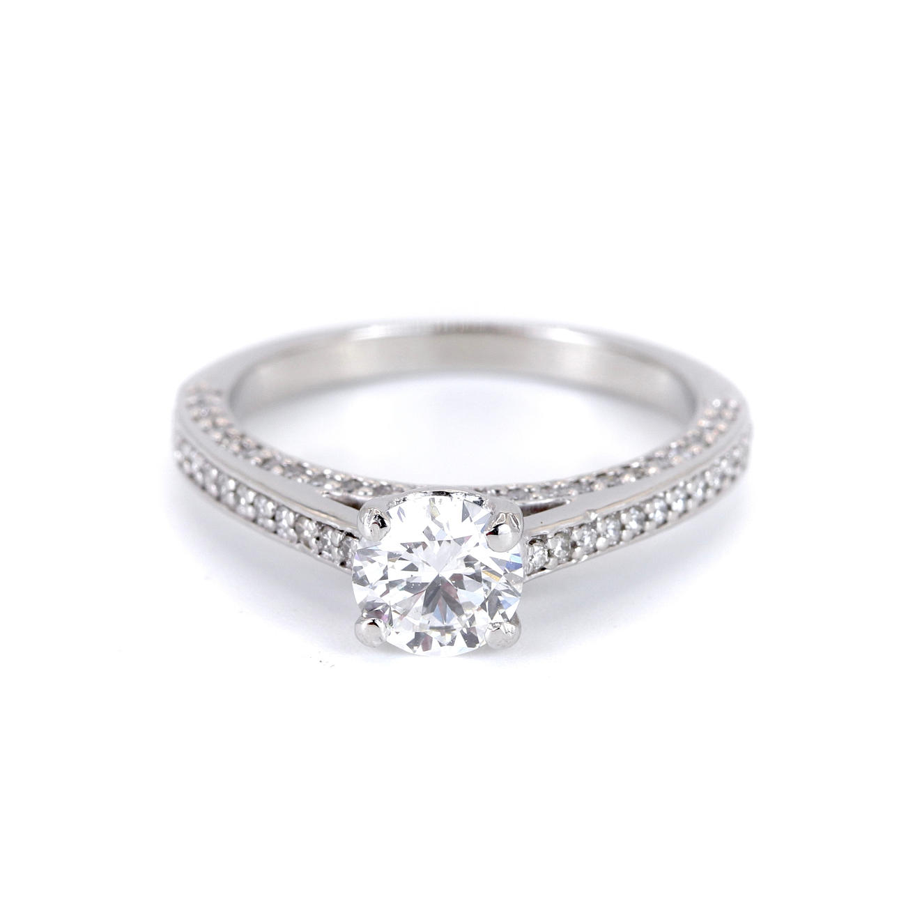 PLATINUM DIAMOND SET SOLITAIRE RING.