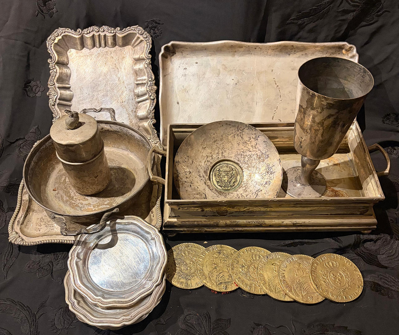 Various silvery metal objects, 20th Century.