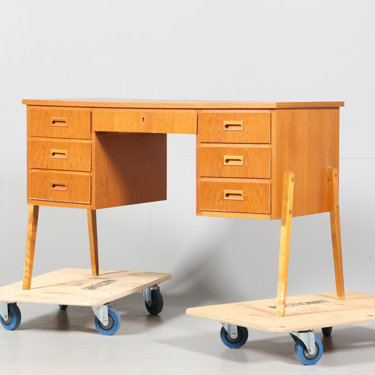 A 1950s/60s teak desk.