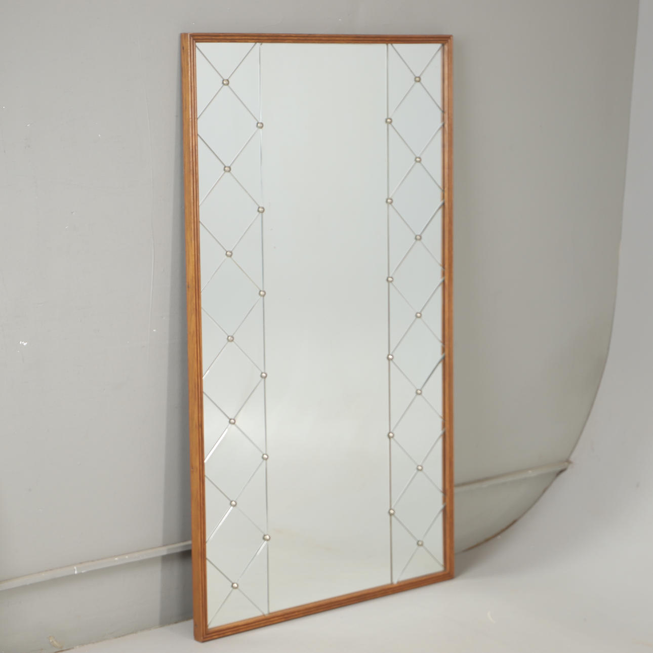 A Swedish modern oak mirror, 1940s.