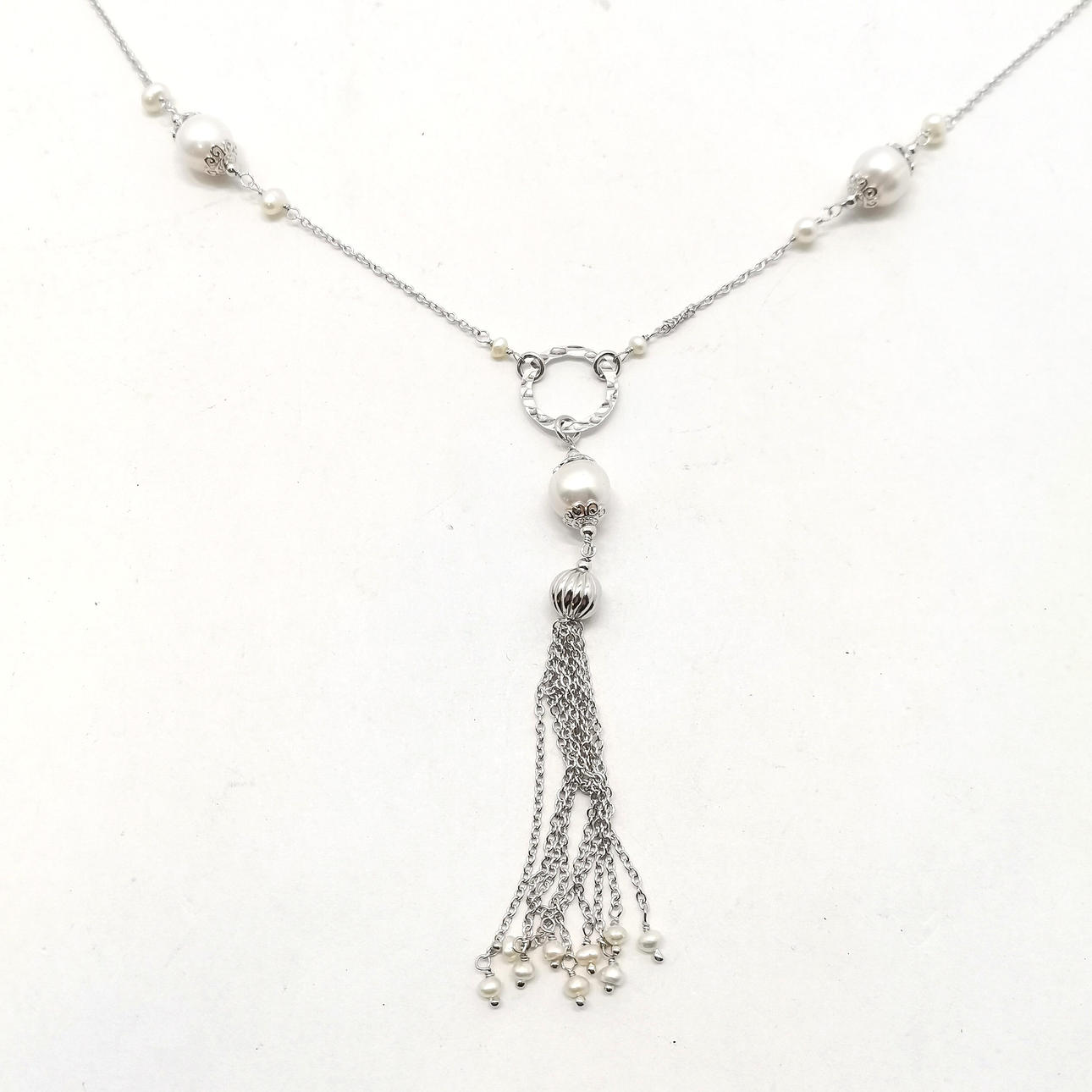 SILVER & PEARL LONG NECKLACE WITH TASSEL DROP.