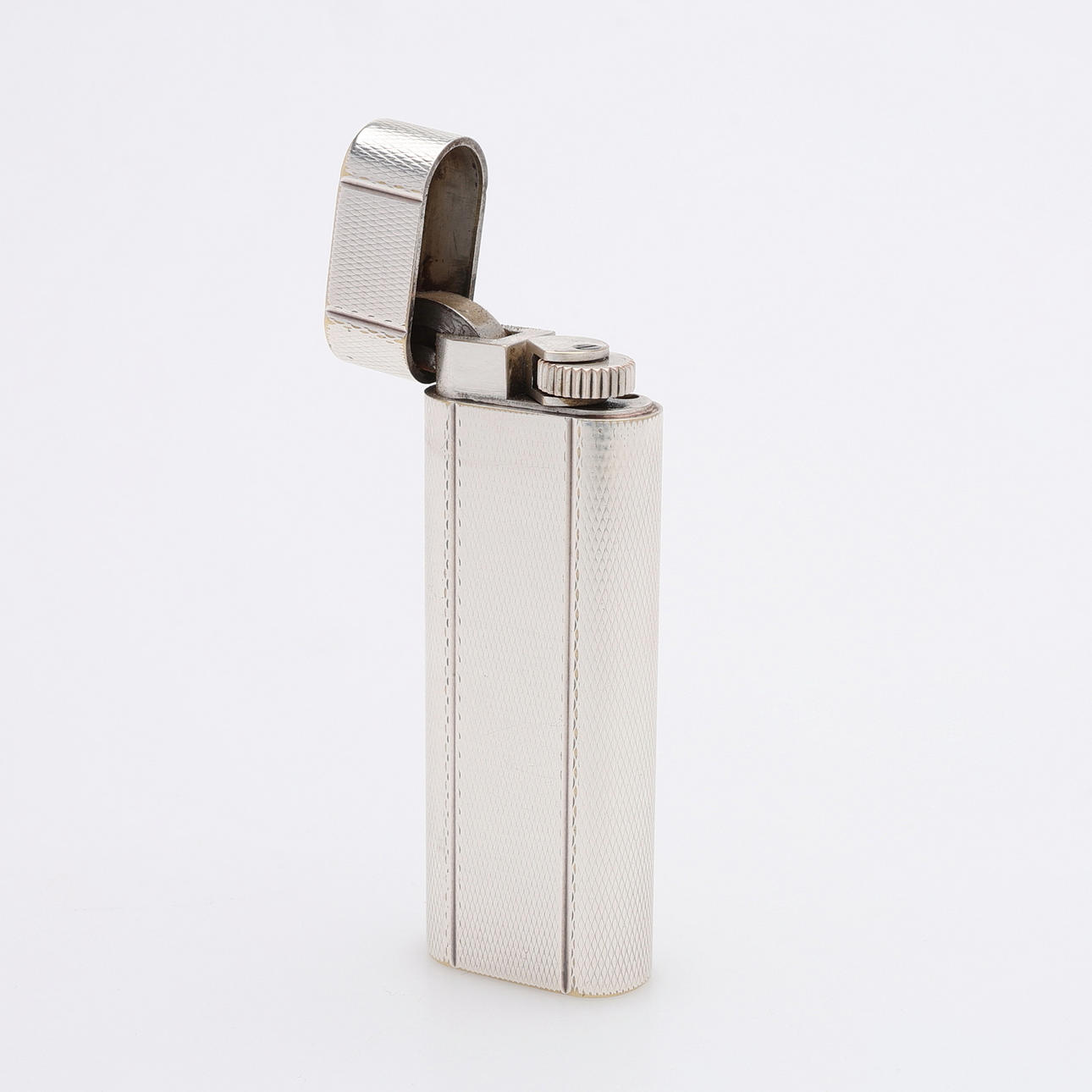 A CARTIER LIGHTER, 1980's, silver plated.