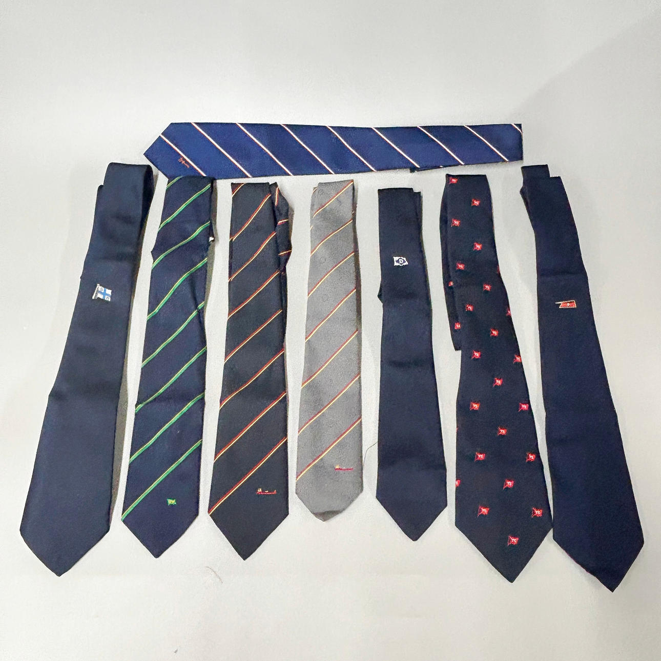 EIGHT SHIPPING COMPANY TIES.