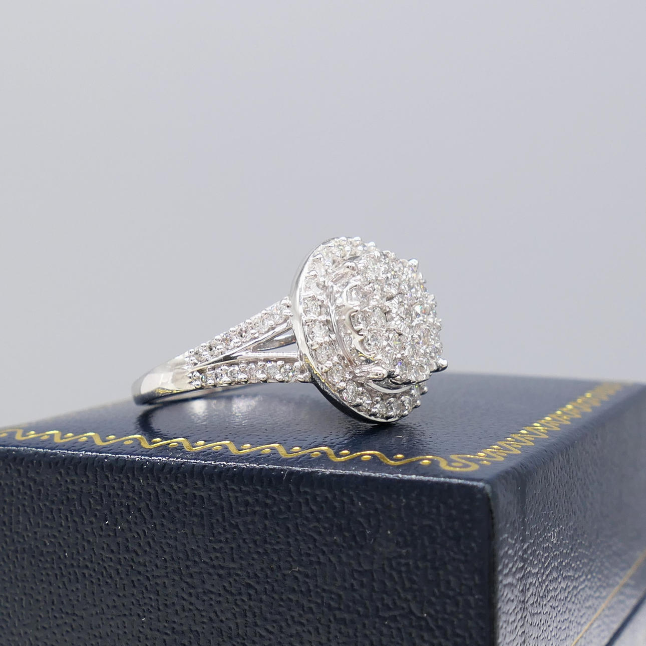 1.00CT DIAMOND cluster ring.