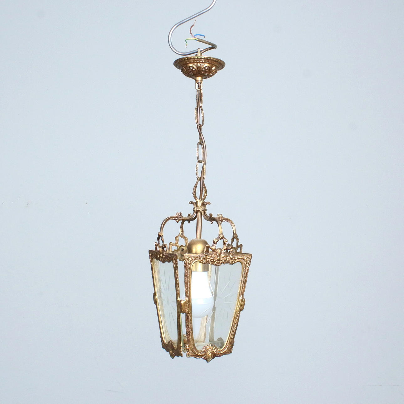 golden lantern/ceiling light.