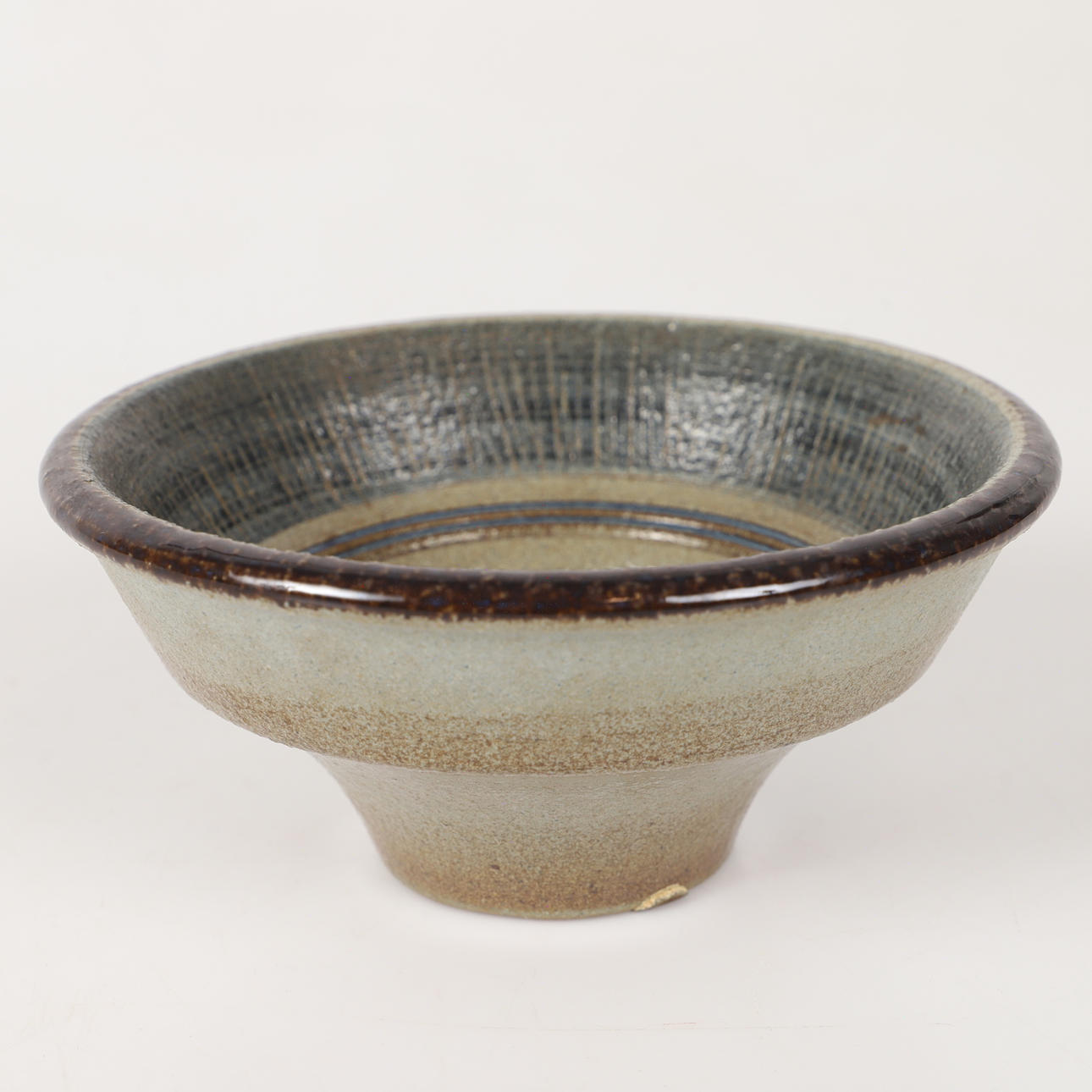 A ceramic bowl, Søholm, signed SJ.