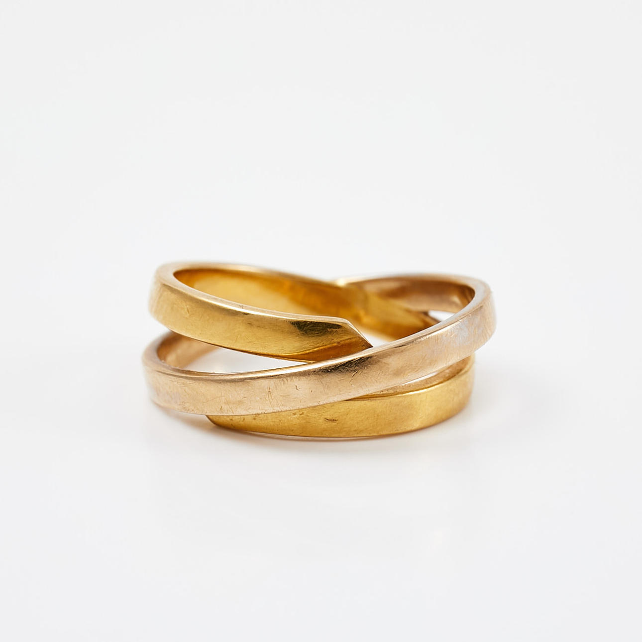 RING. 18k two-tone gold, Gold find, crossed.