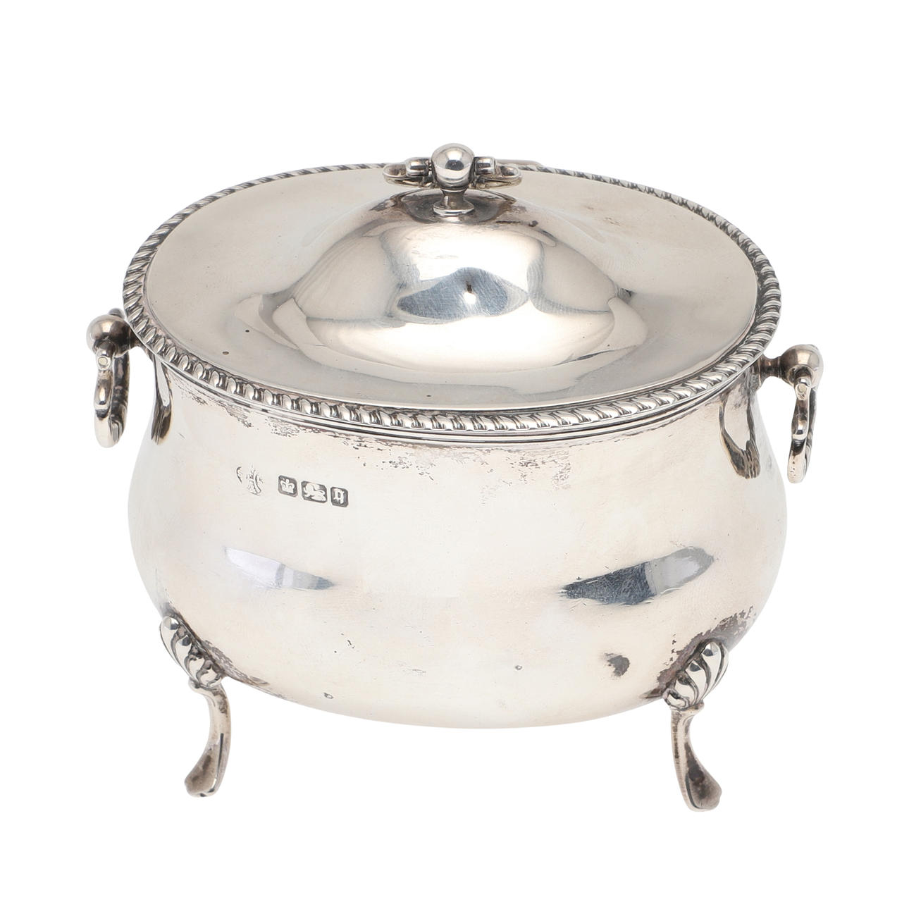 AN EDWARDIAN SILVER CADDY.
