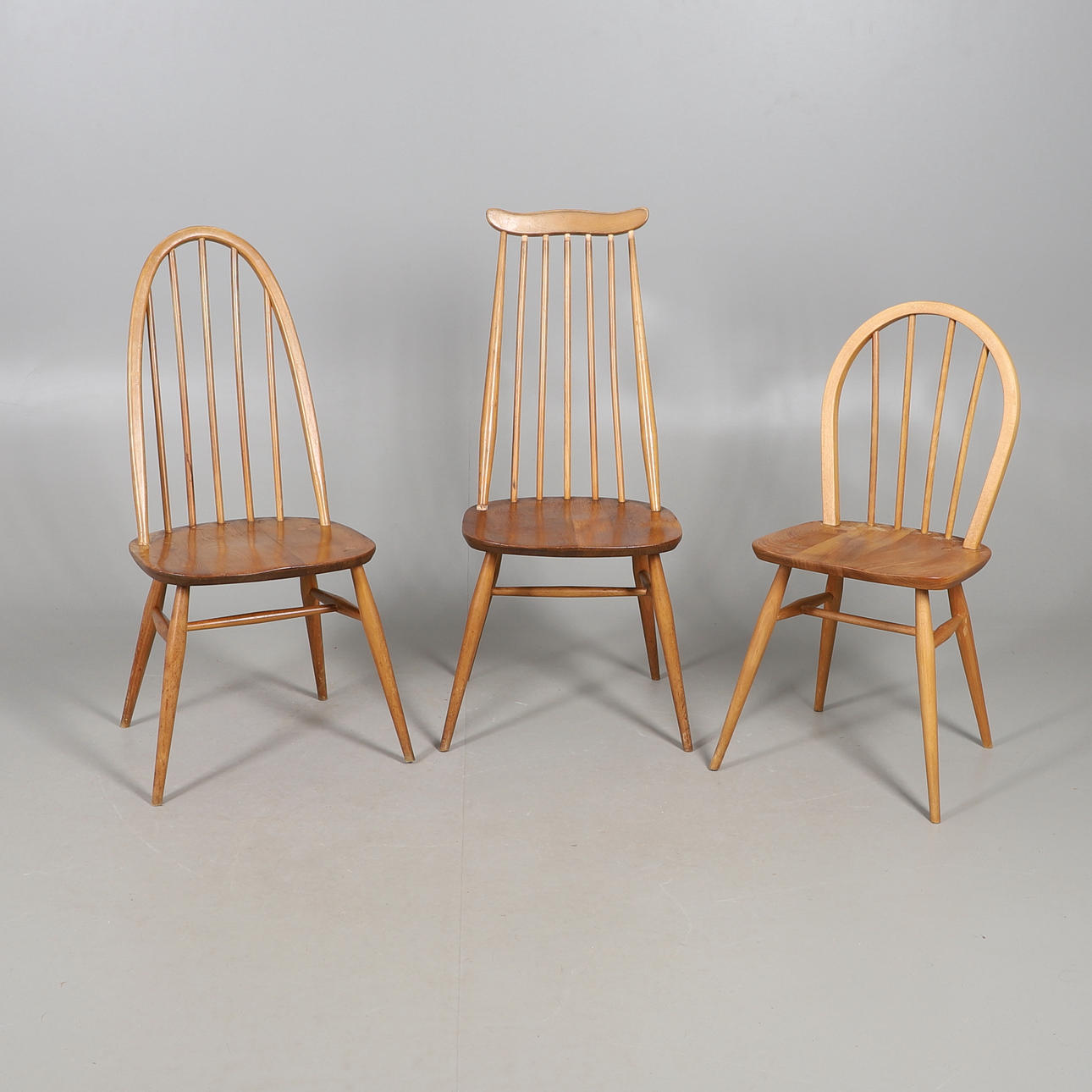 AN ELCOL SPINDLE BACK CHAIR AND TWO OTHERS.