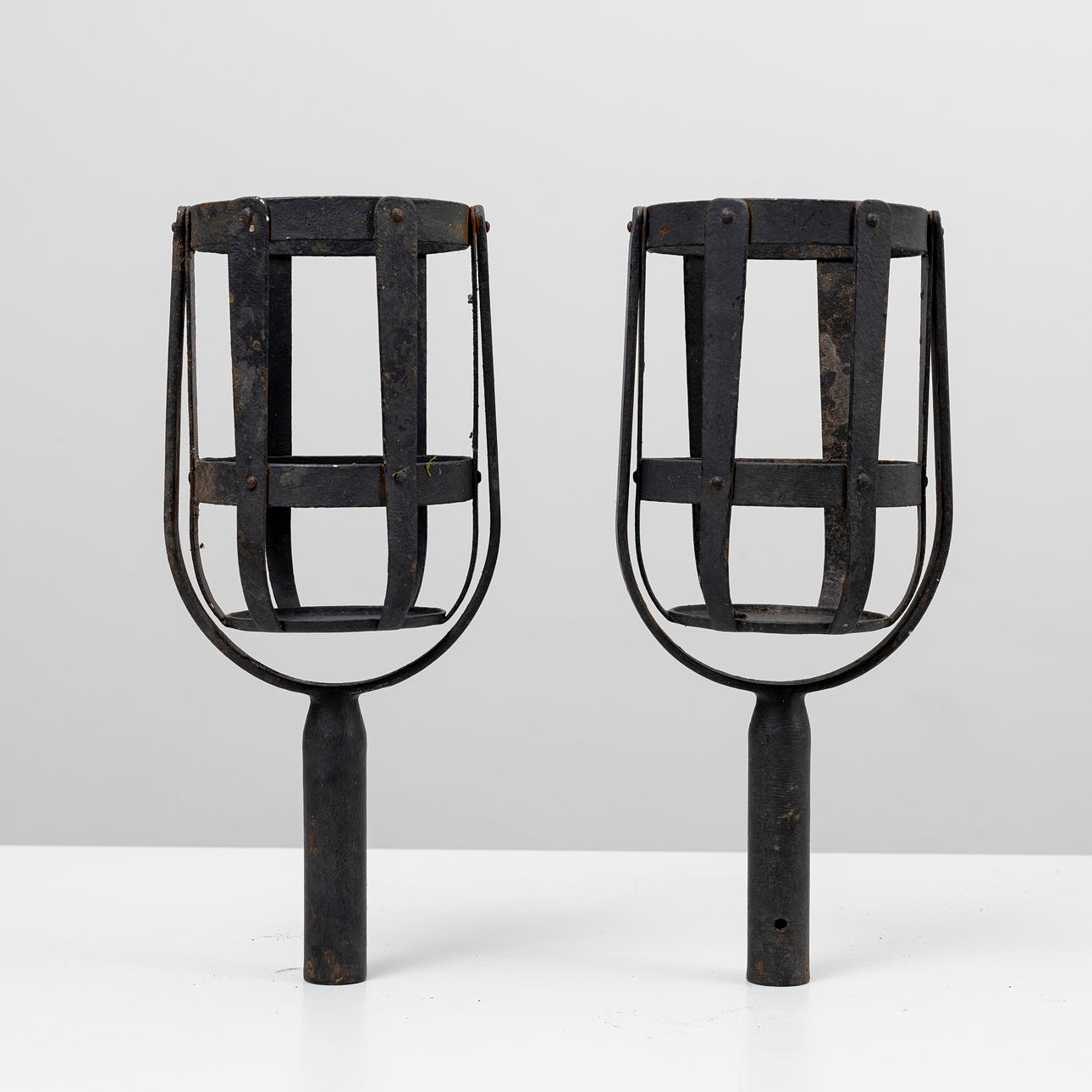 Two iron firebaskets, 20th century.