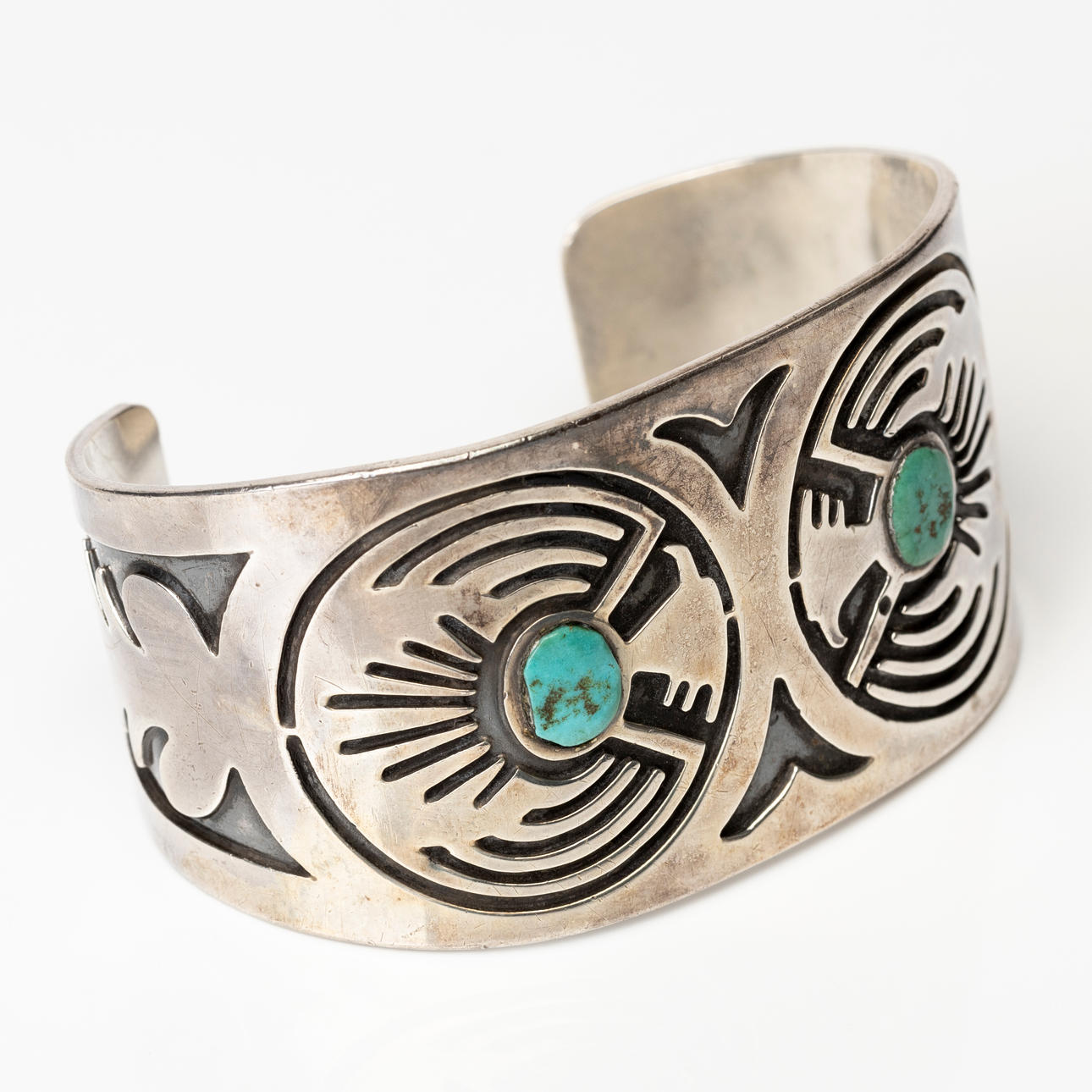 BRACELET, silver with 2 green stones.