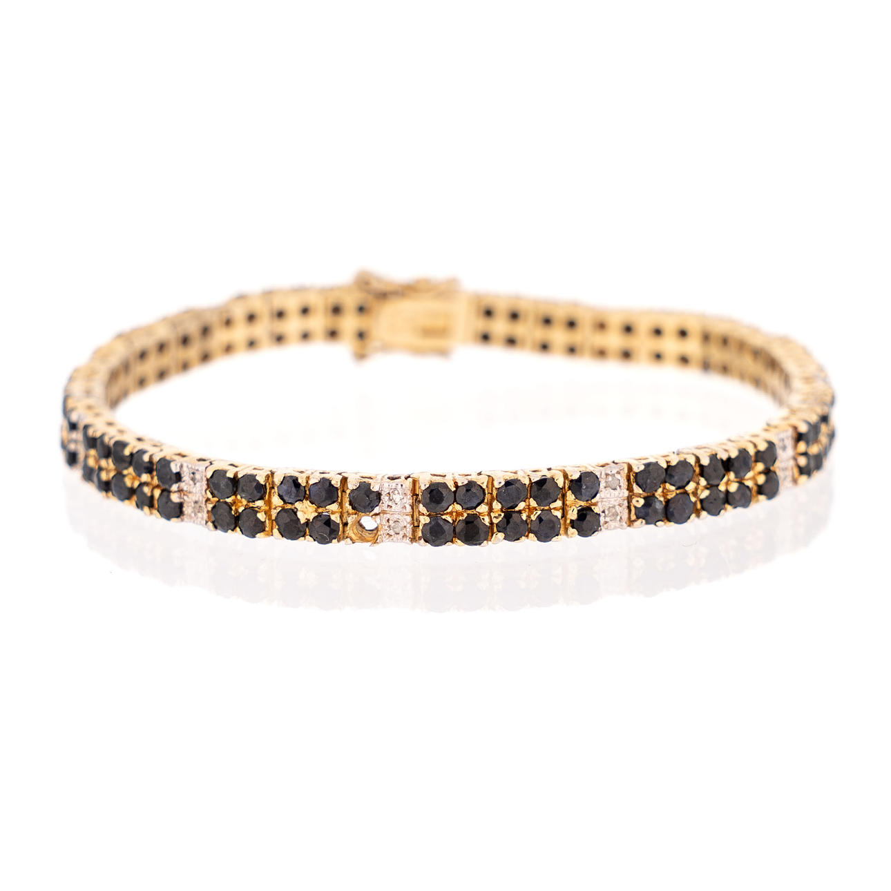 ARMBAND. förgyllt silver, med safirer & diamanter 1900-tal.