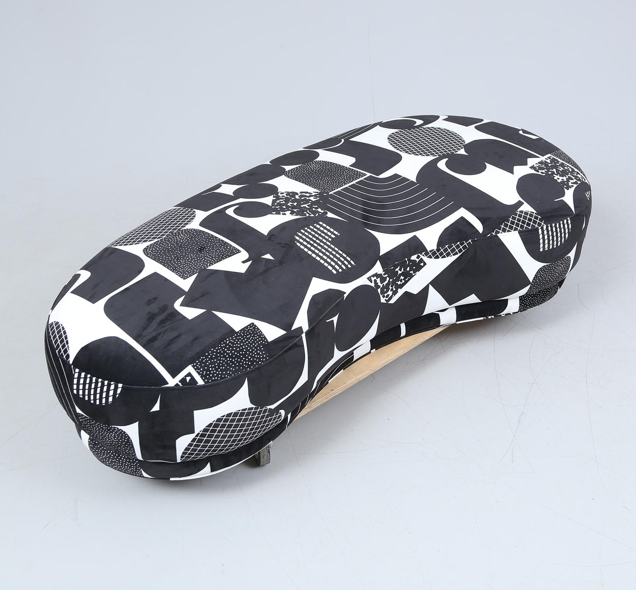 A contemporary patterned textile bench, Jotex.