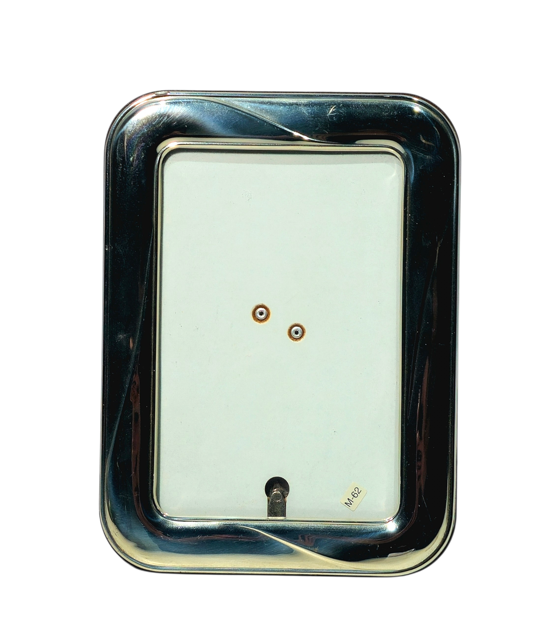 Punched silver photo frame.