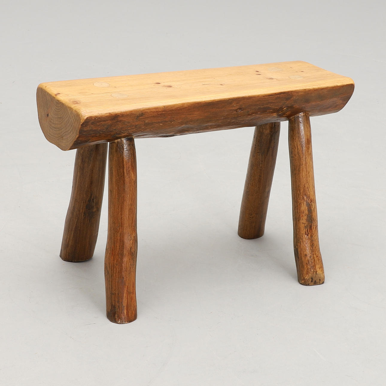 A wooden stool, mid 20th century.