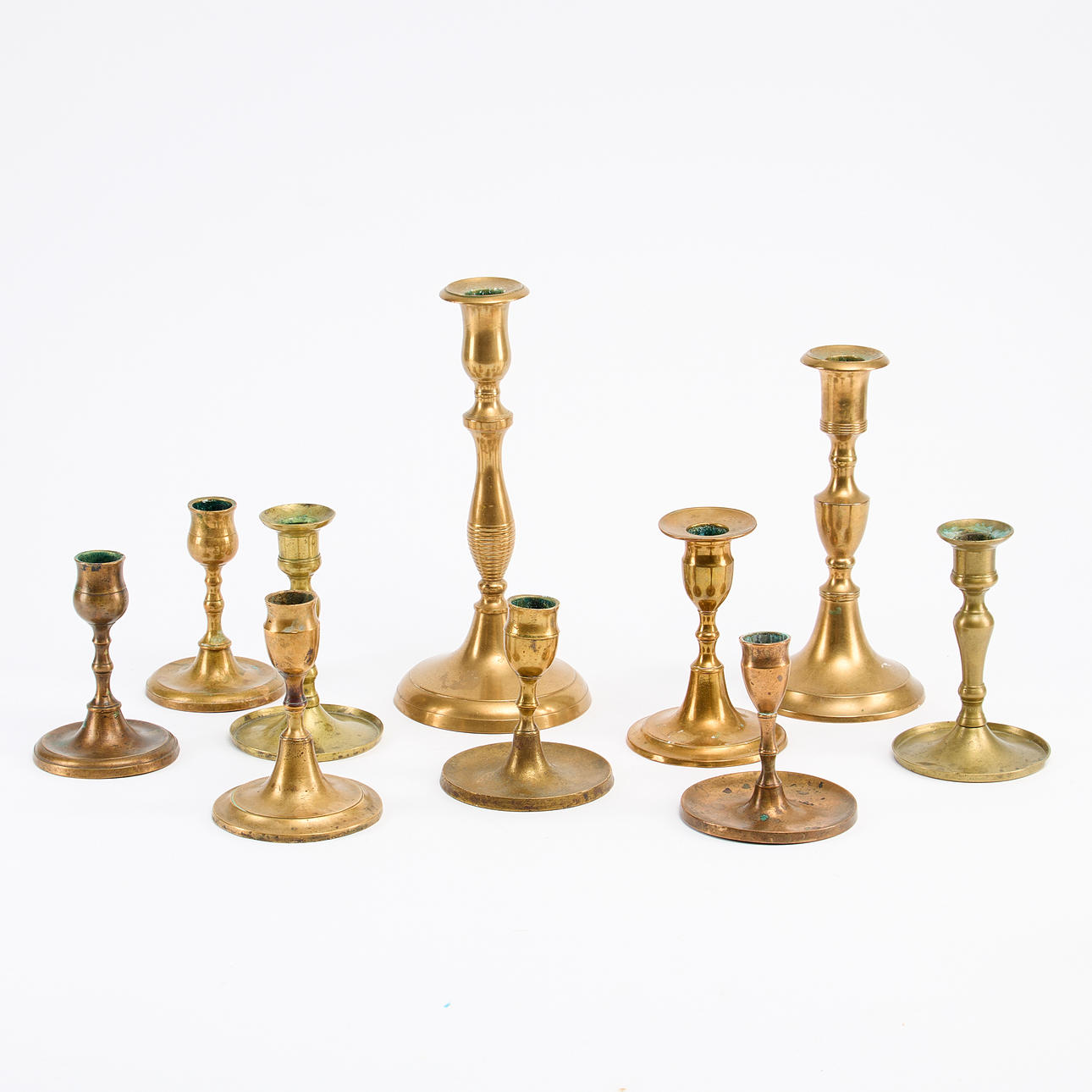 CANDLESTICKS 10 pieces around 1900.