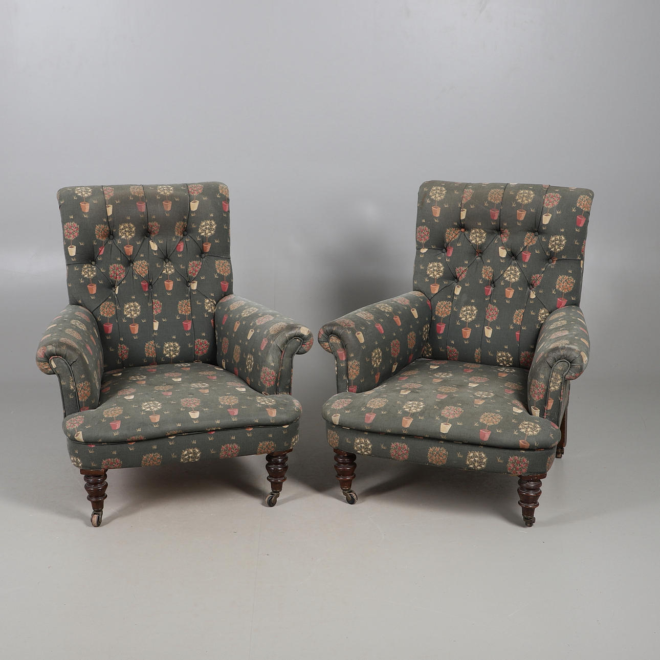 PAIR OF VICTORIAN BUTTON BACK ARMCHAIRS.
