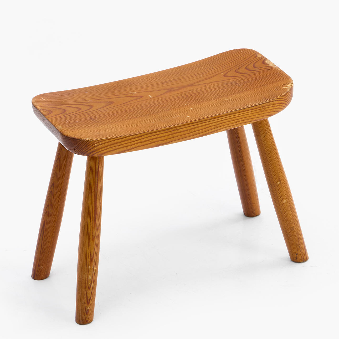 A mid 20th century pine stool.