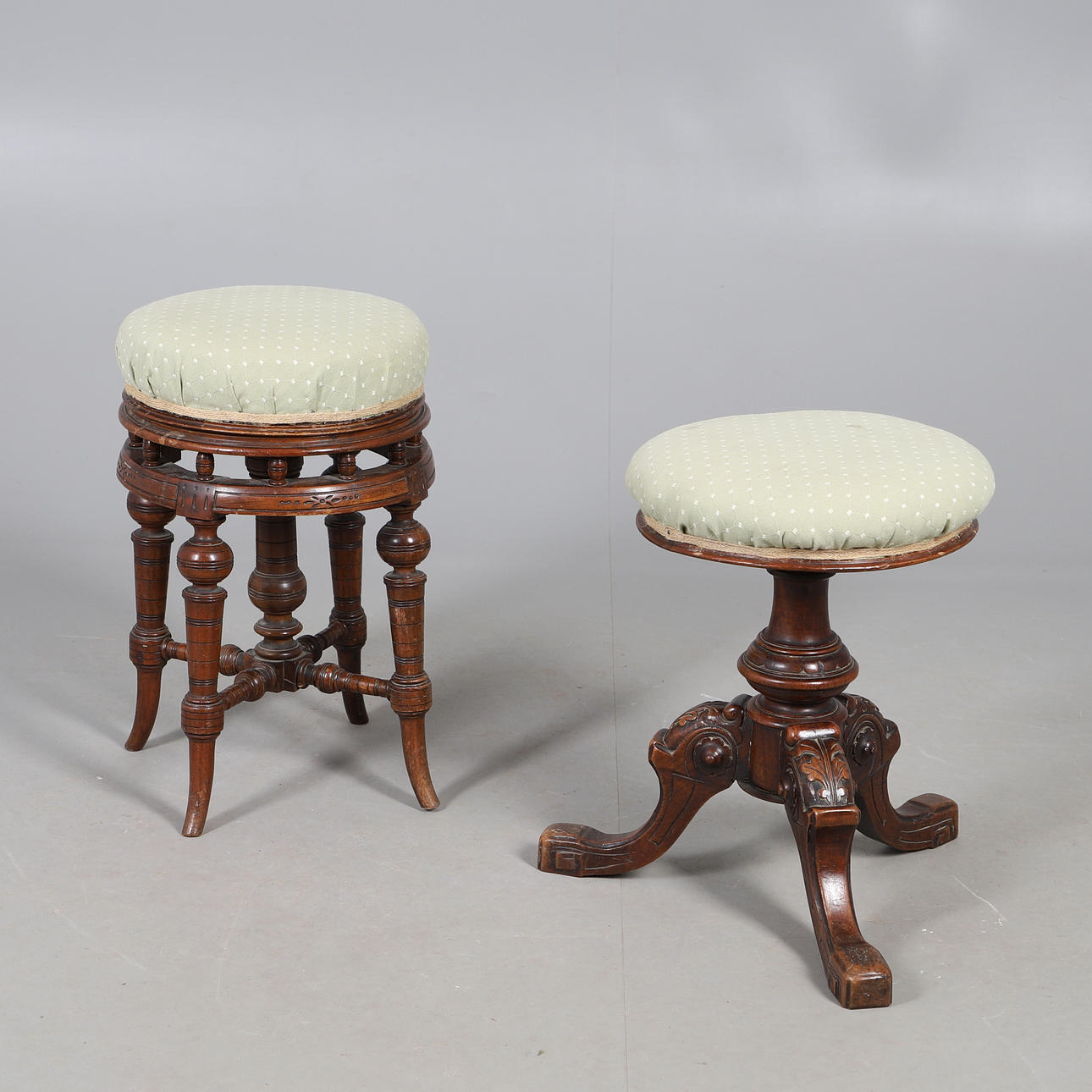 TWO VICTORIAN ADJUSTABLE PIANO STOOLS.