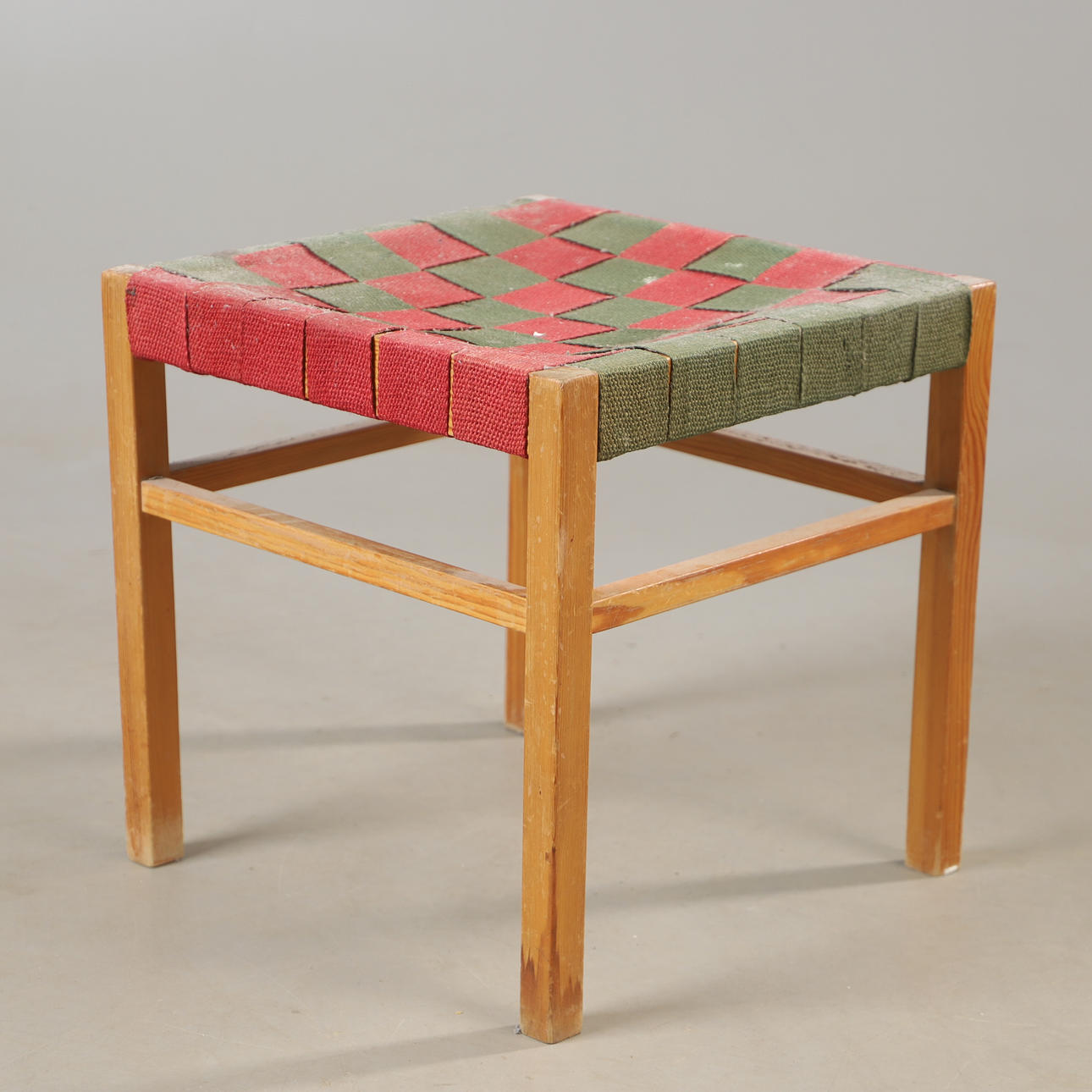 A pine stool with saddle seat, mid 20th century.