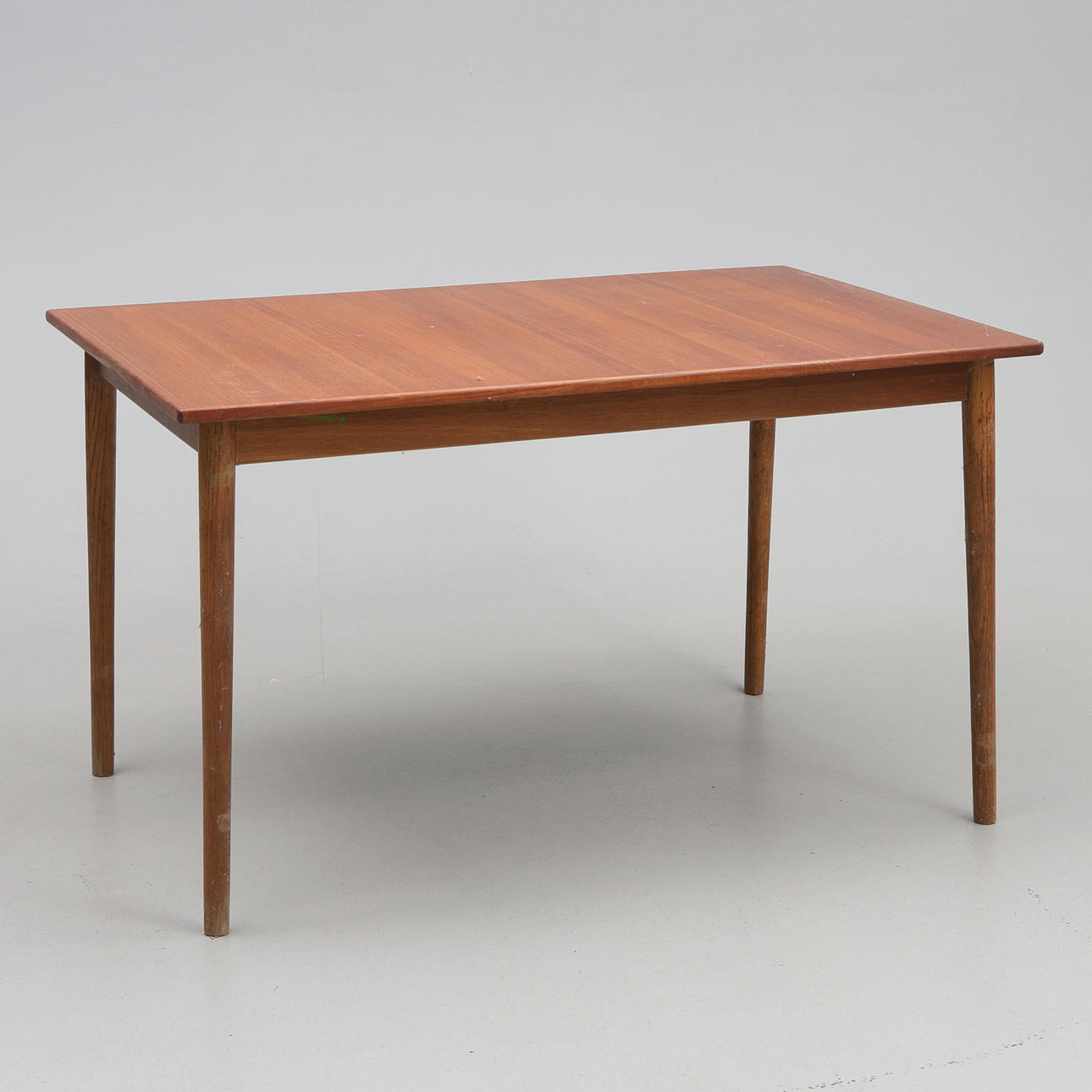 KITCHEN TABLE. Teak with extra disc 1960s/70s.