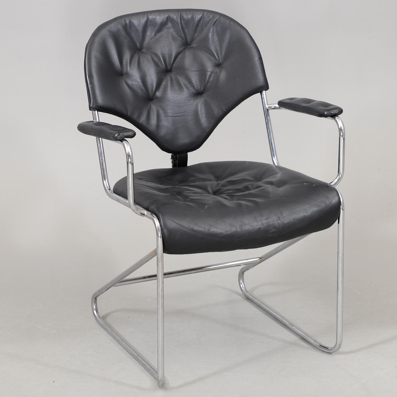 SAM LARSSON. Armchair, “Sam”, chrome/leather, Dux.