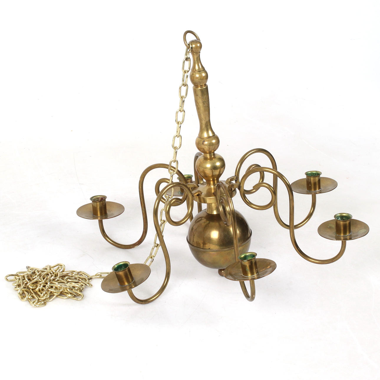 A 20th-century baroque brass ceiling chandelier.