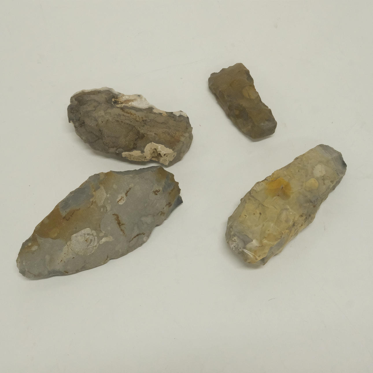 STONE AGE OBJECTS, FOUR PIECES.