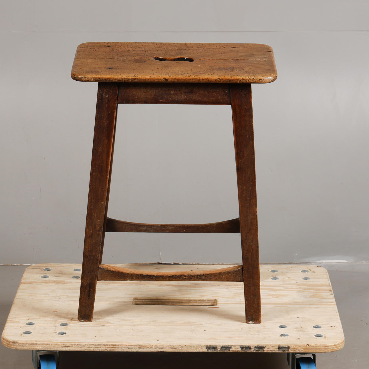 A LATE 19TH CENTURY FRUITWOOD STOOL.