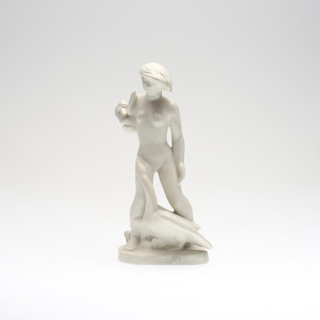 FIGUR, porslin, "Leda och svanen", Nils Hansson, Gefle, signerad i godset.