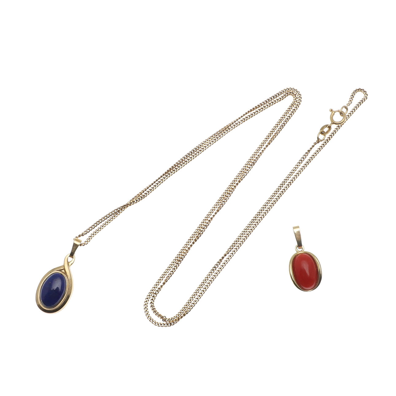 A LAPIS LAZULI SINGLE STONE PENDANT.