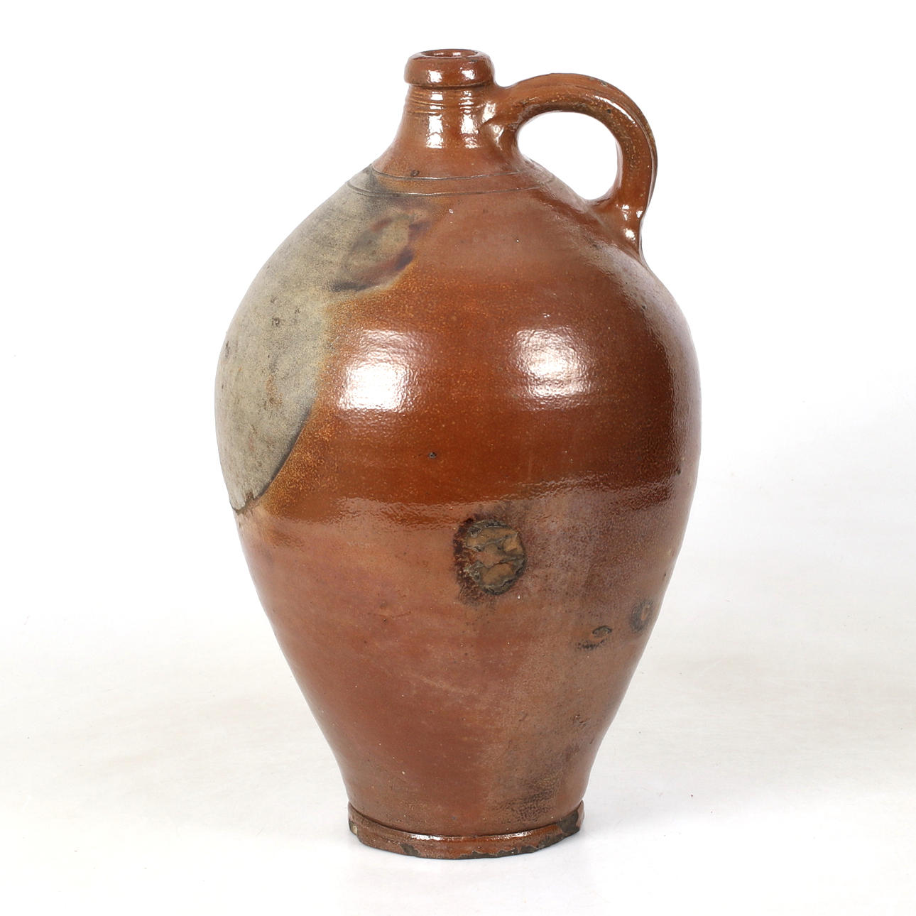 A 19th century salt-glazed stoneware mug.