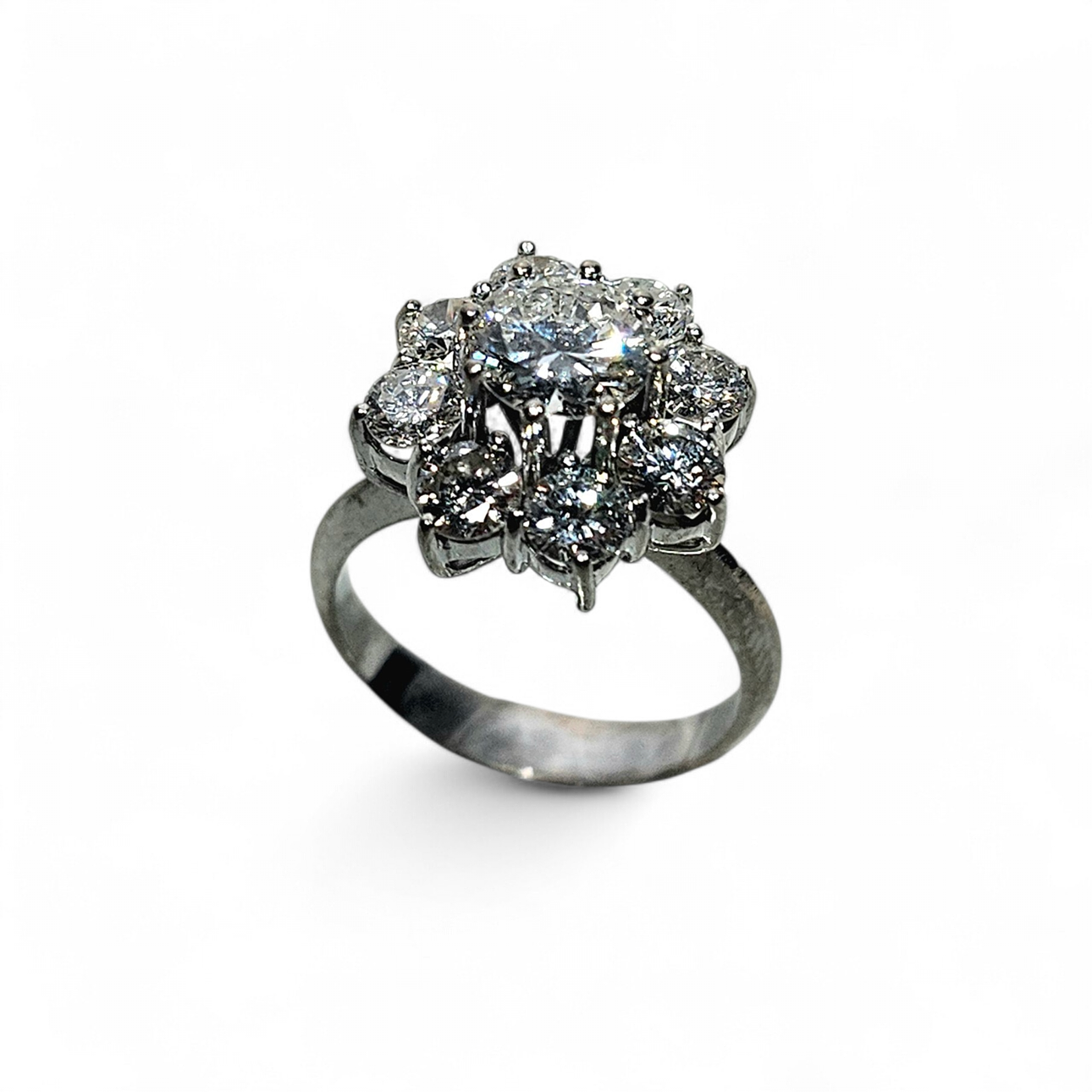18k white gold diamond cluster ring.