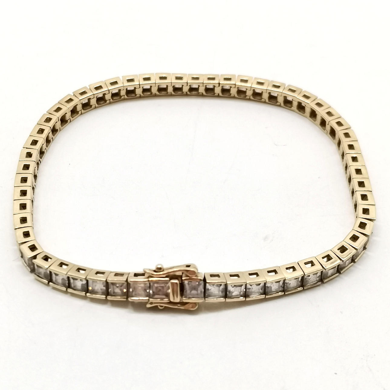 9CT GOLD CZ TENNIS BRACELET.