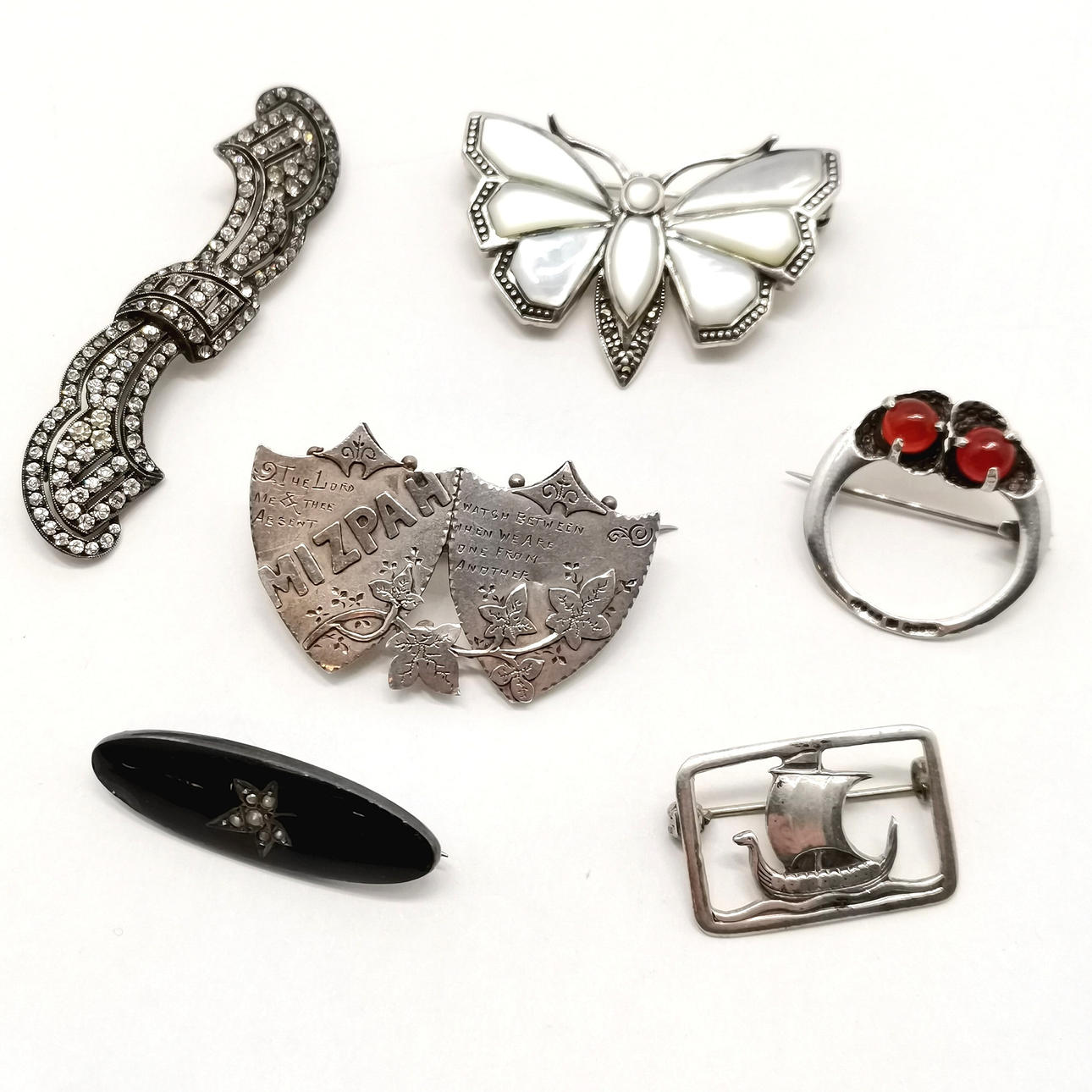 6 X SILVER BROOCHES.