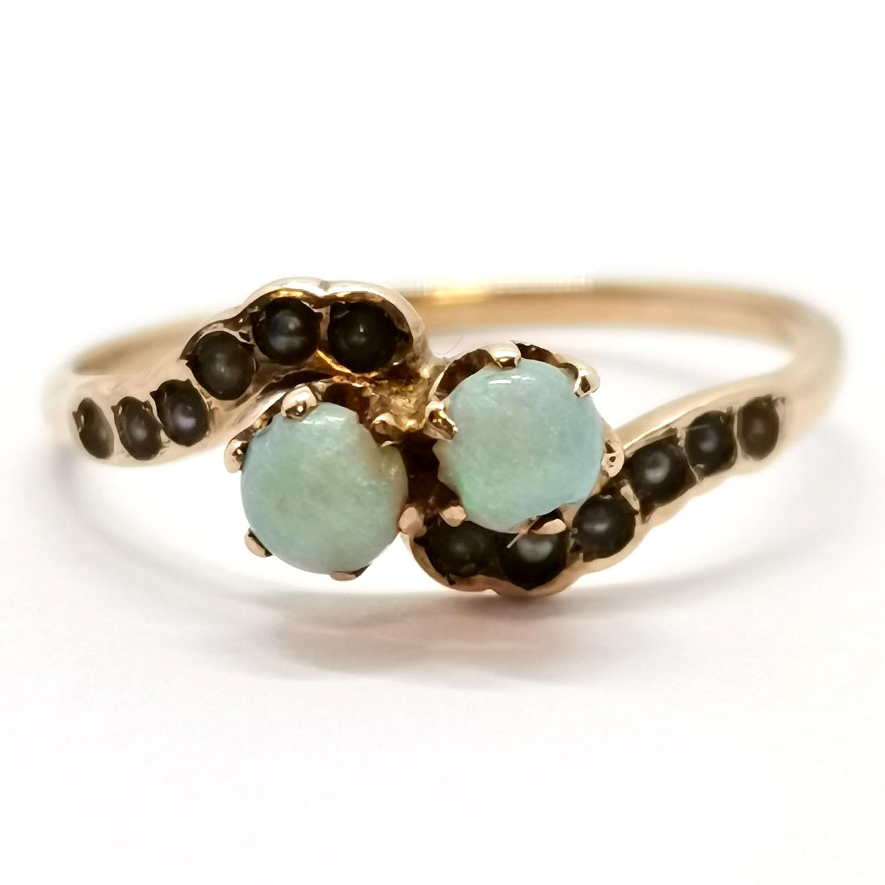 GOLD OPAL & SEED PEARL CROSSOVER RING.