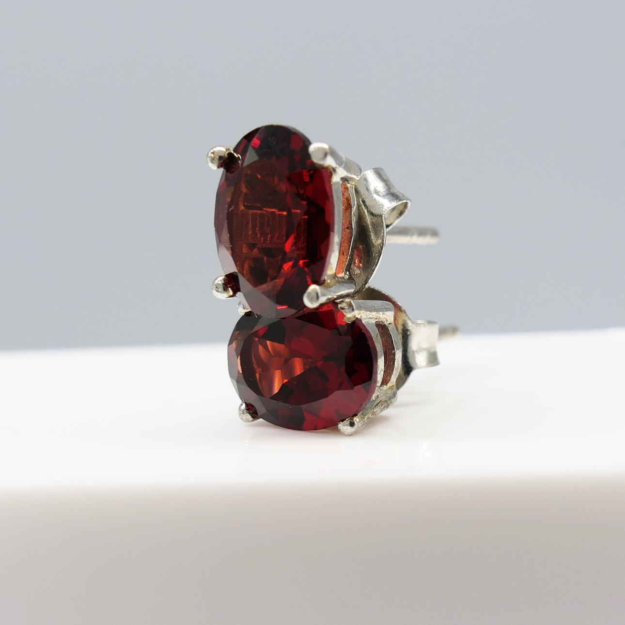 GARNET gemstone ear studs.