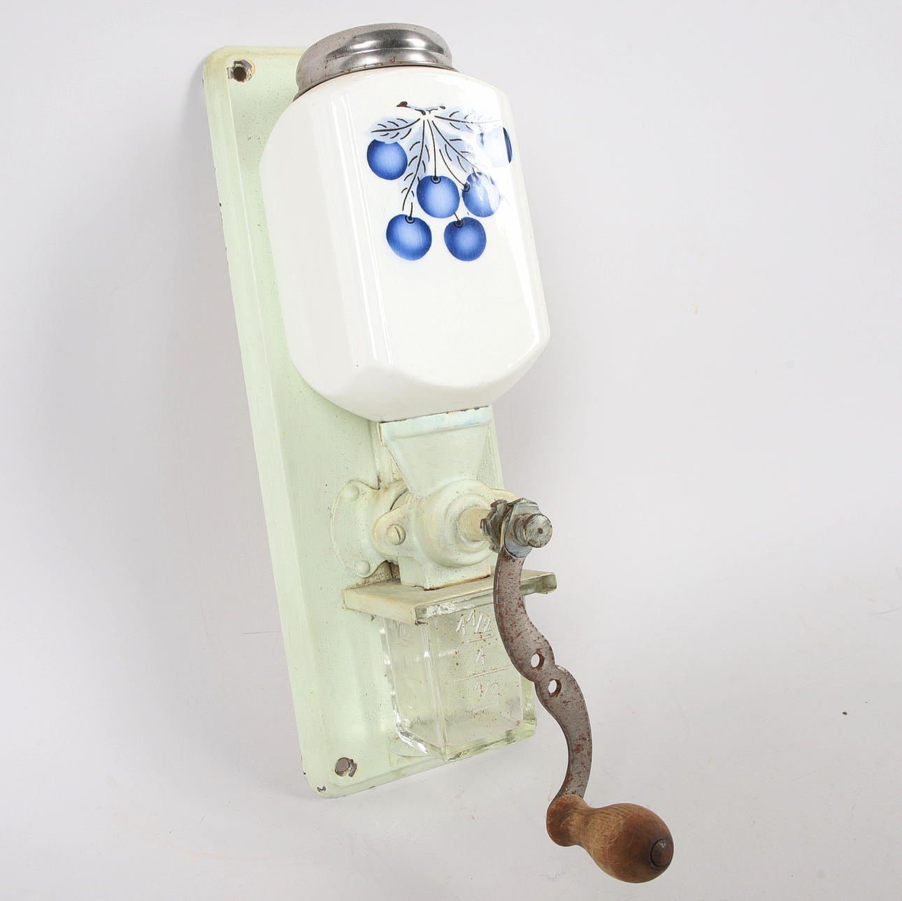 A wall-hung coffee grinder, first half of the 20th century ...