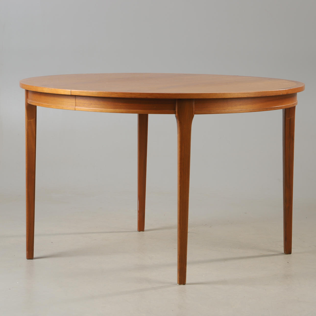 A mid 20th century walnut dining table.