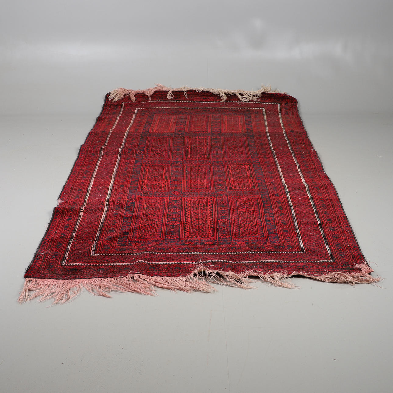 A BALUCH RUG.