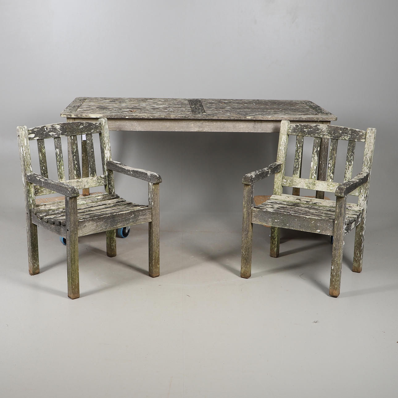 LARGE GARDEN TABLE WITH TWO COSMO BRANDED CHAIRS.