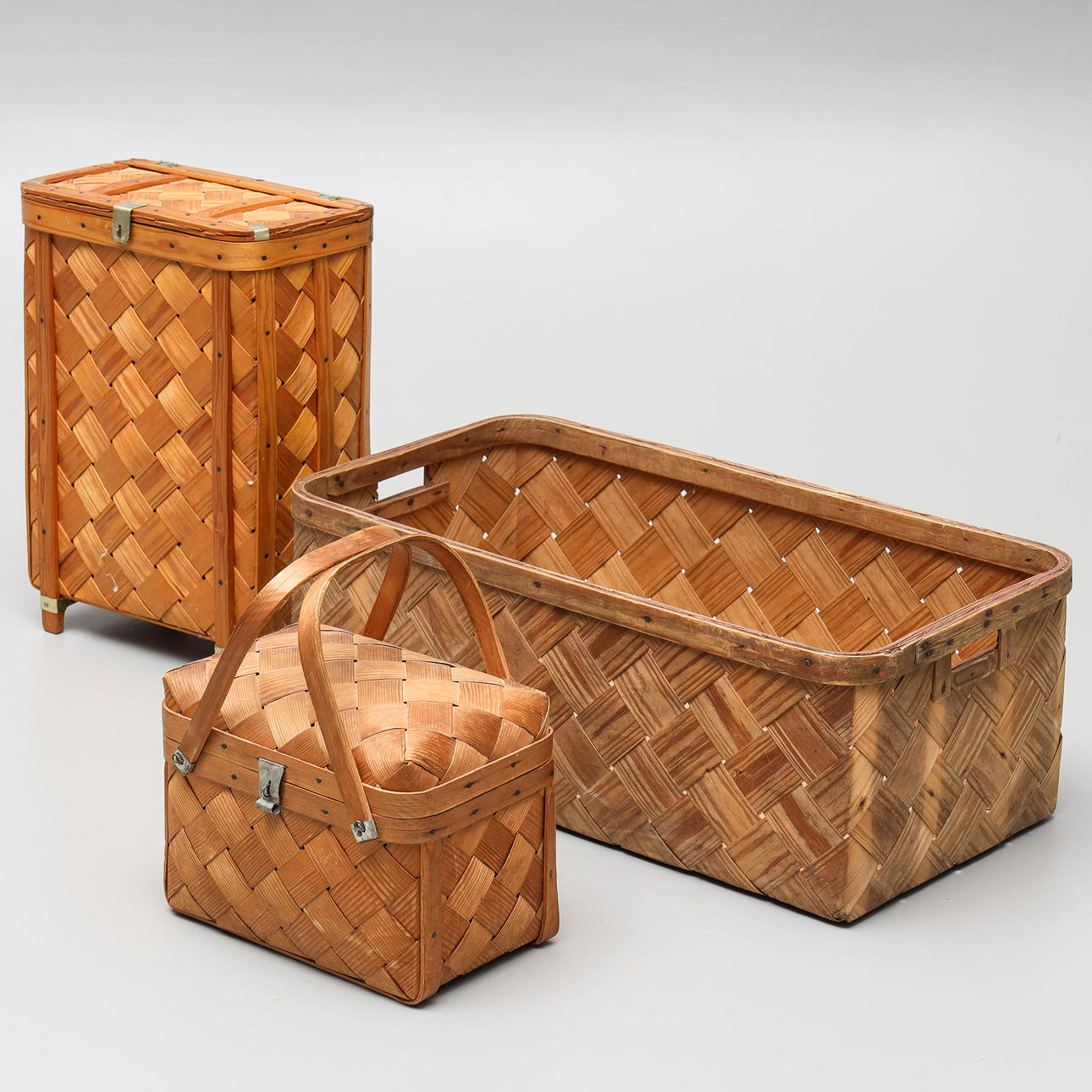 Three 20th century wicker baskets.